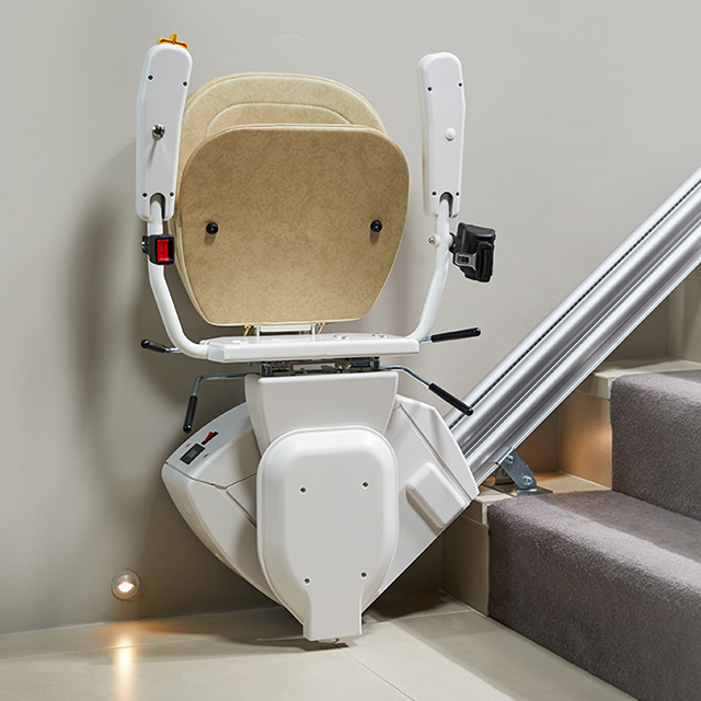 Synergy stairlift seat positioned for access at the landing